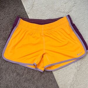 Nike Women’s Orange Athletic Shorts with Purple Trim